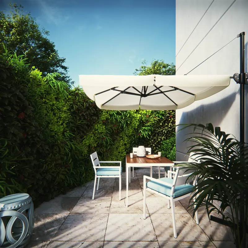 Garden privativo do térreo com guarda-sol, mesa e jardim vertical