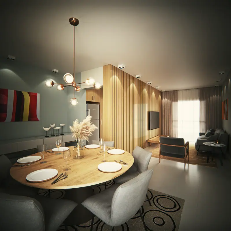Sala de jantar com mesa redonda de madeira e a sala de estar ao fundo, no mesmo ambiente